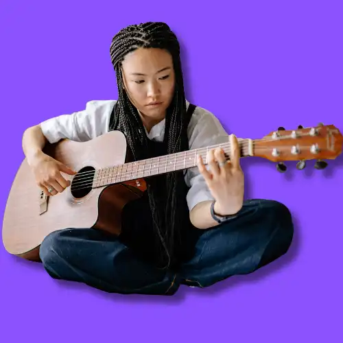 An image of one of our students playing at our group music lessons