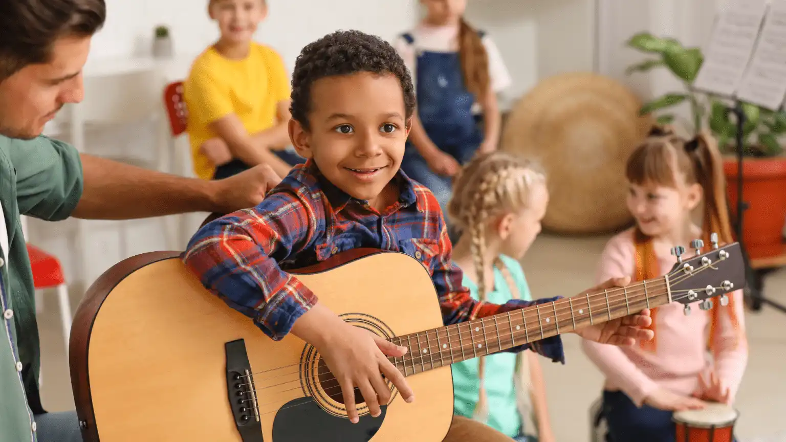 An image of one of our students playing at our group music lessons