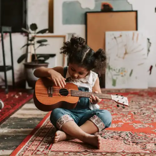 An image of one of our students playing at our group music lessons